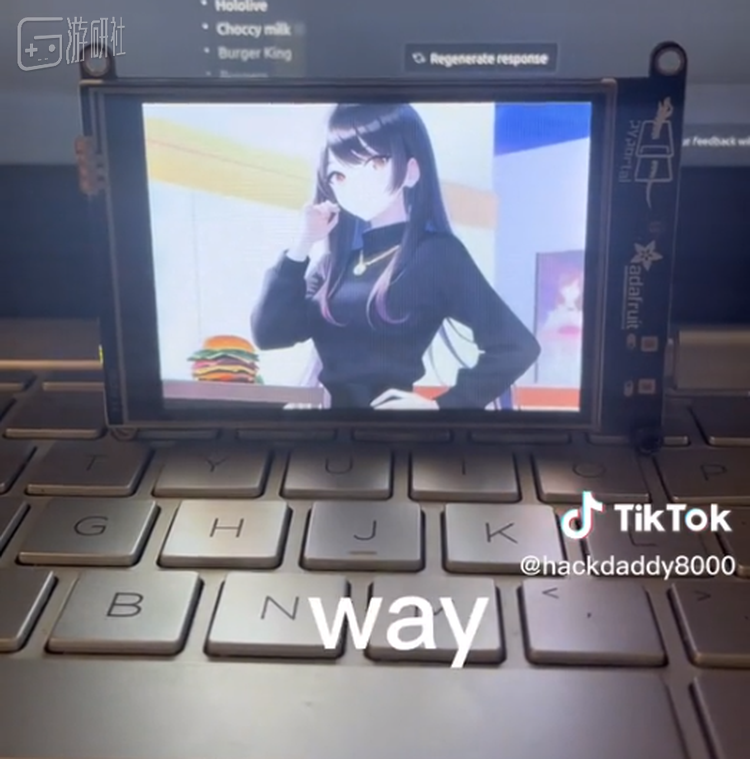 当然，屏幕上还是应景地生成了一张美少女吃汉堡图